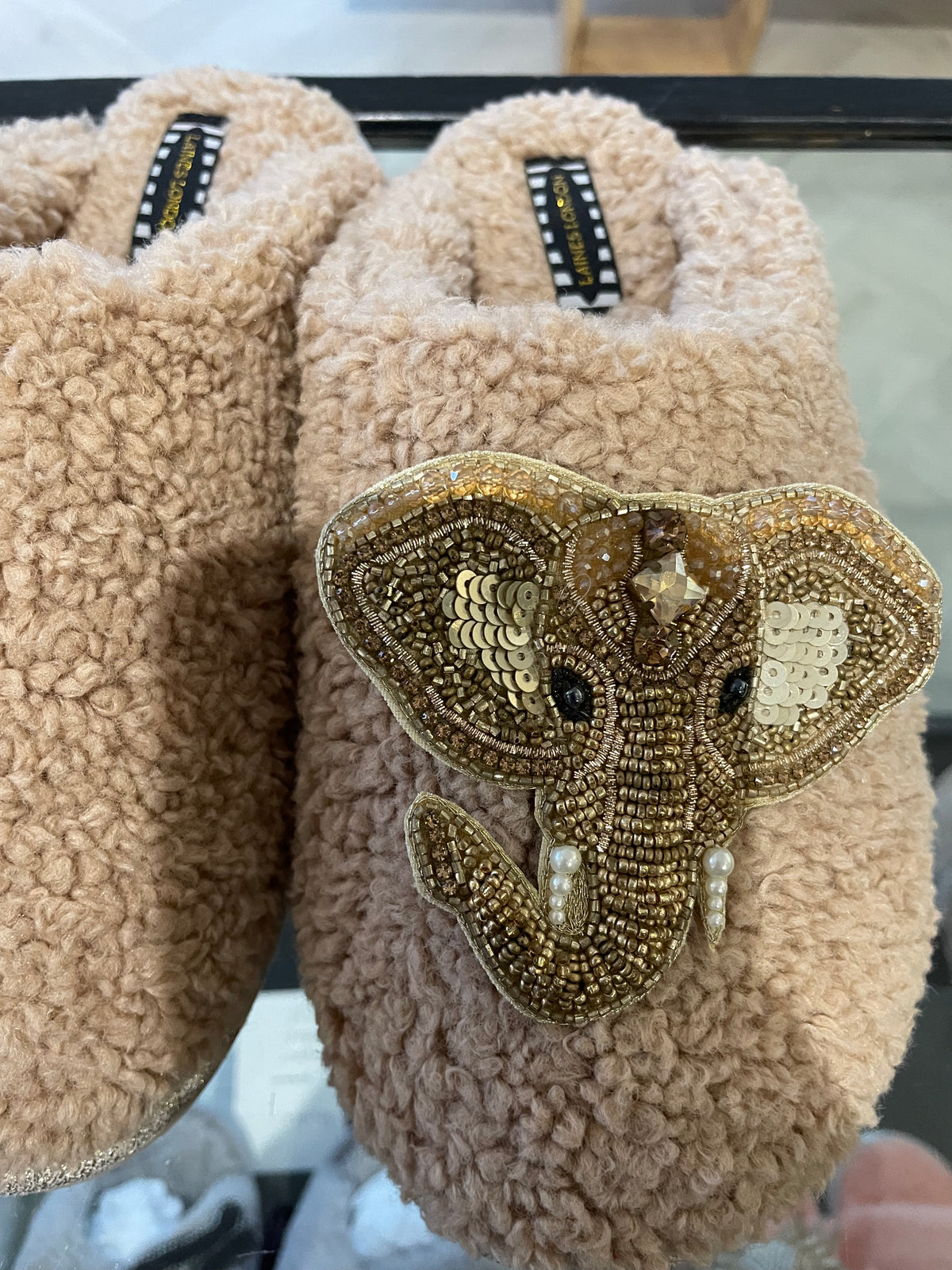 Beige closed toe elephant slippers