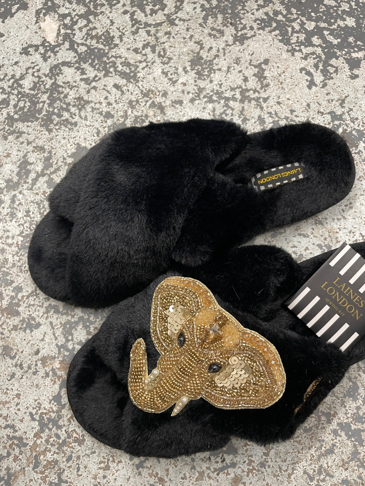 Black open toe elephant slippers